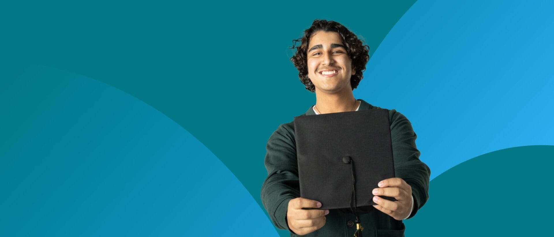 Student boy with graduate hat in his hands